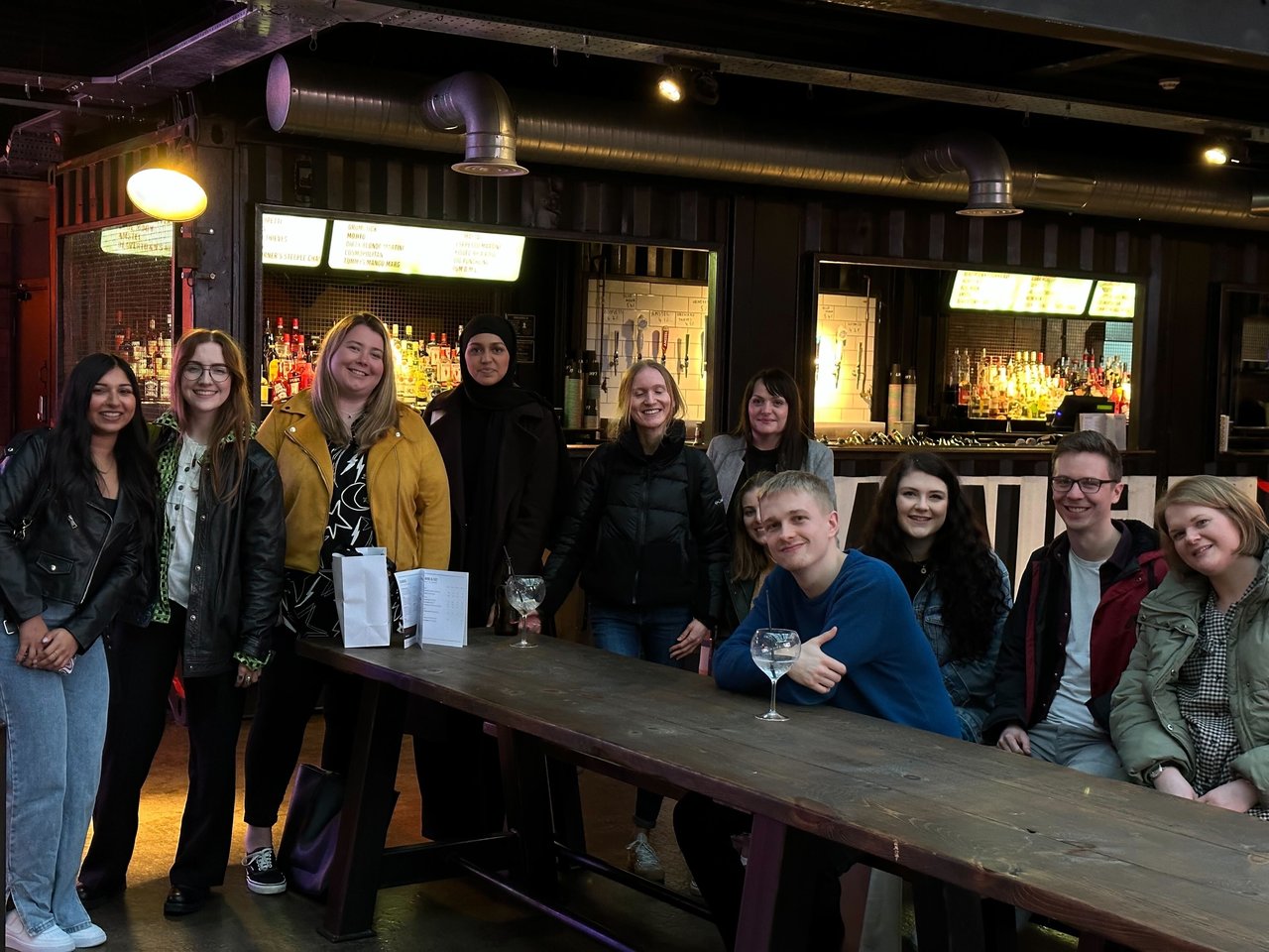 A group photo of the RKH PR team smiling at the camera