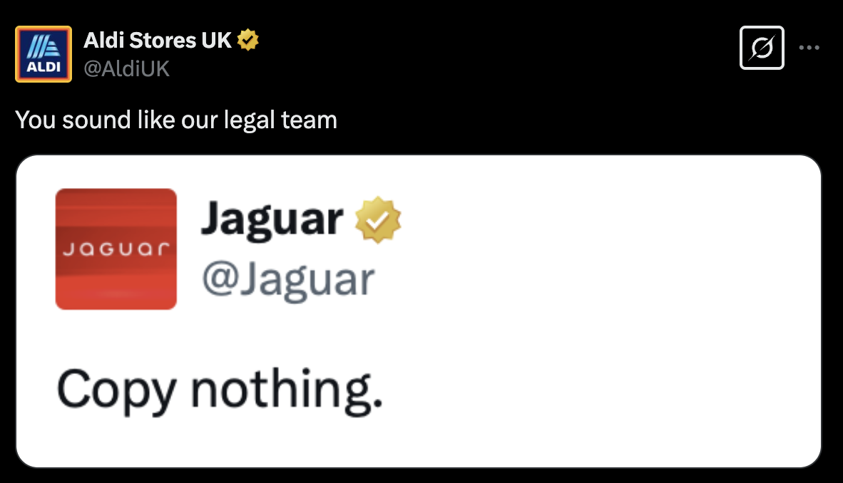 A screenshot of Aldi's post on Twitter, where they have posted a screenshot of Jaguar's Twitter which says 'copy nothing.' Aldi have added their own comment, which says 'you sound like our legal team'.