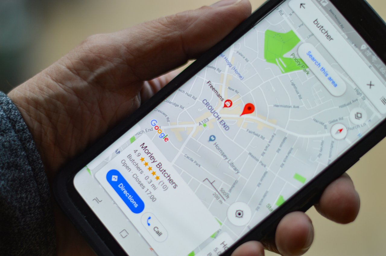 A smartphone user searching for a local butchers' using Maps
