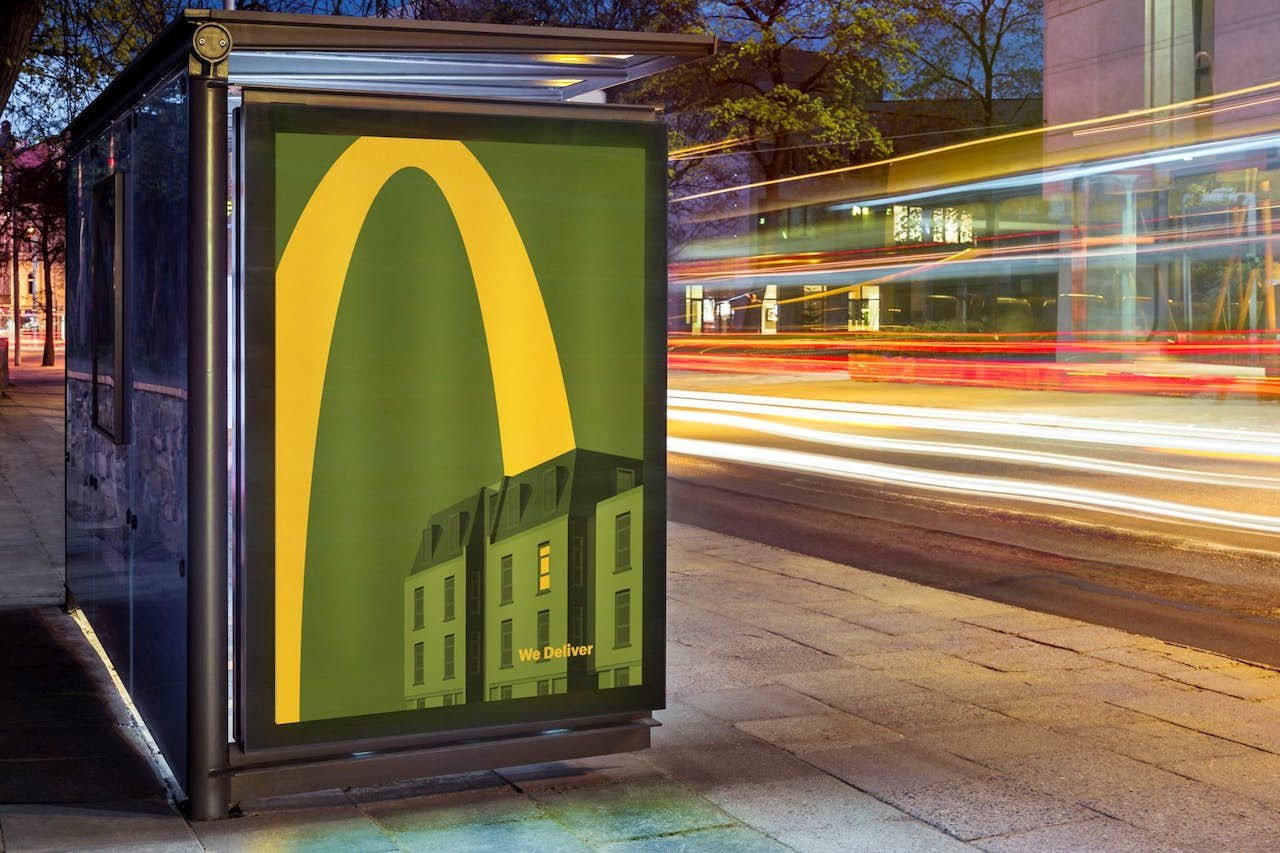 A McDonald's bus stop ad, showing part of their famous golden arches logo. The ad is instantly recognisable as McDonald's despite not showing the full logo