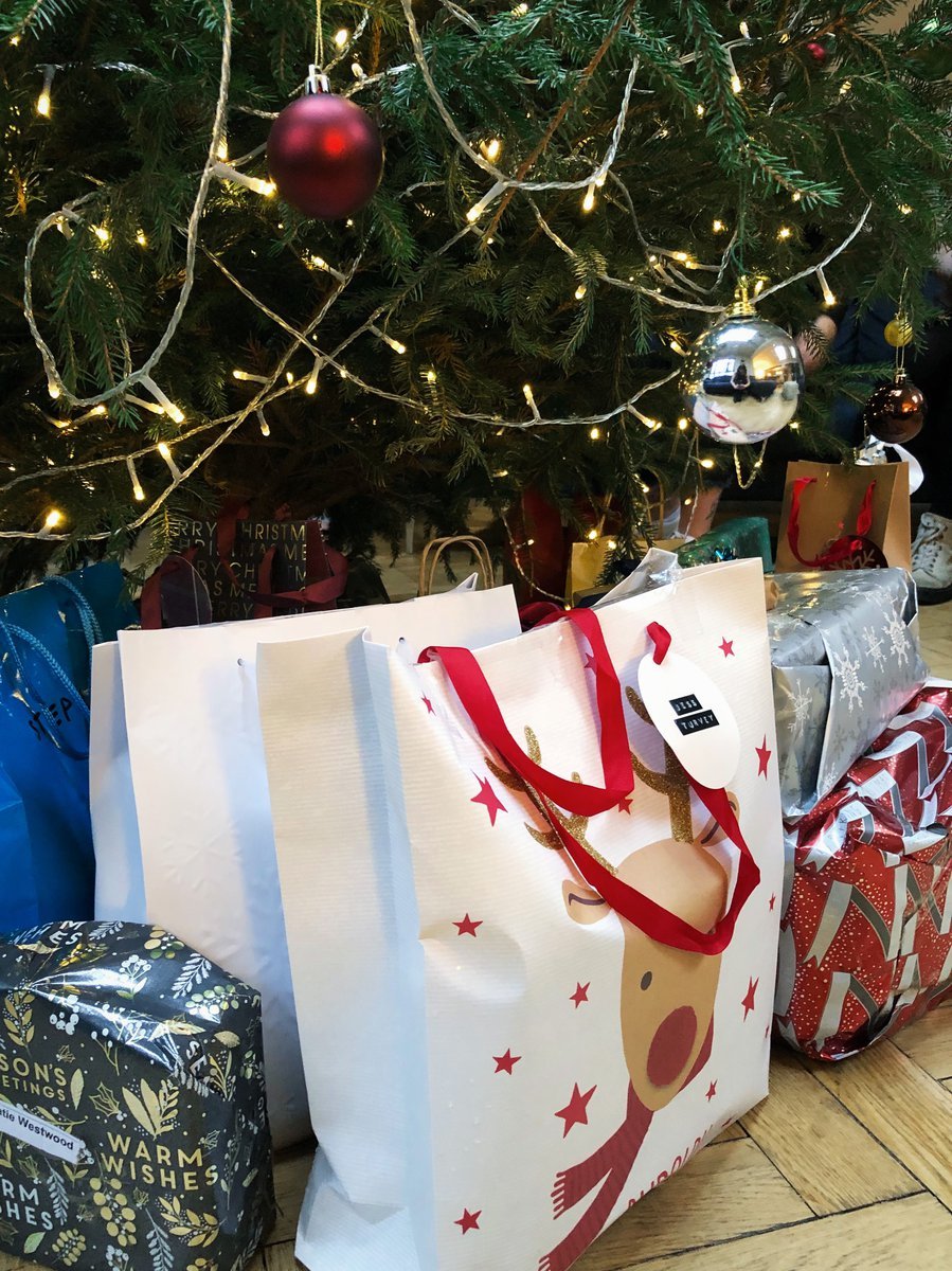 gift bags for people under tree